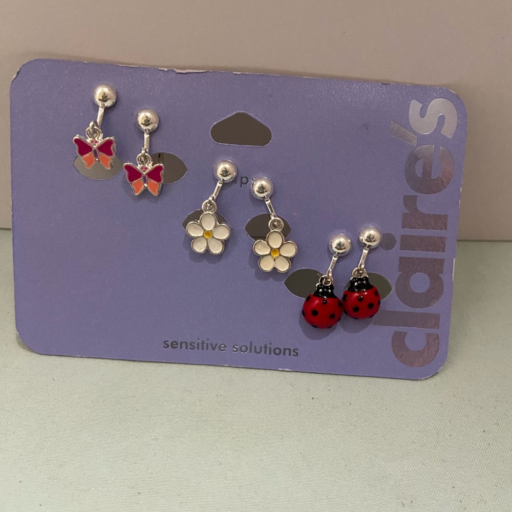 Claire's Red Butterfly, White Flower, and Red Ladybug Earrings Set